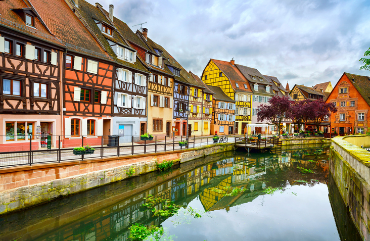 Colmar, Petit Venice, water canal and traditional colorful houses. Alsace, France. Long exposure.