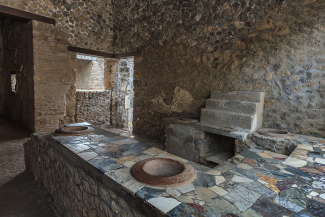 Ancient Pompeii – Thermopolium of Asellina with old food serving counter