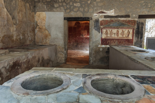 Ancient Pompeii – Thermopolium of Asellina with old food serving counter