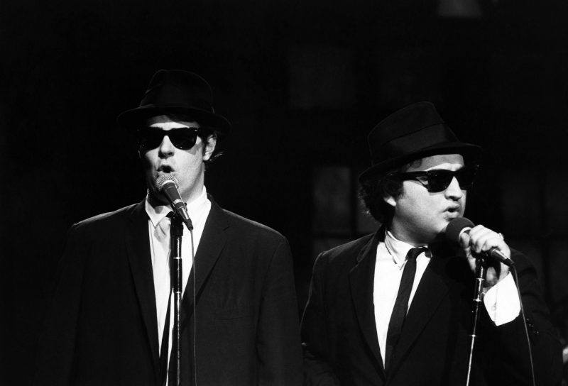 SATURDAY NIGHT LIVE -- Episode 6 -- Pictured: Dan Aykroyd as Elwood Blues, John Belushi as Jake Blues of musical guest the Blues Brothers perform November 18, 1978  (Photo by NBC/NBCU Photo Bank via Getty Images)