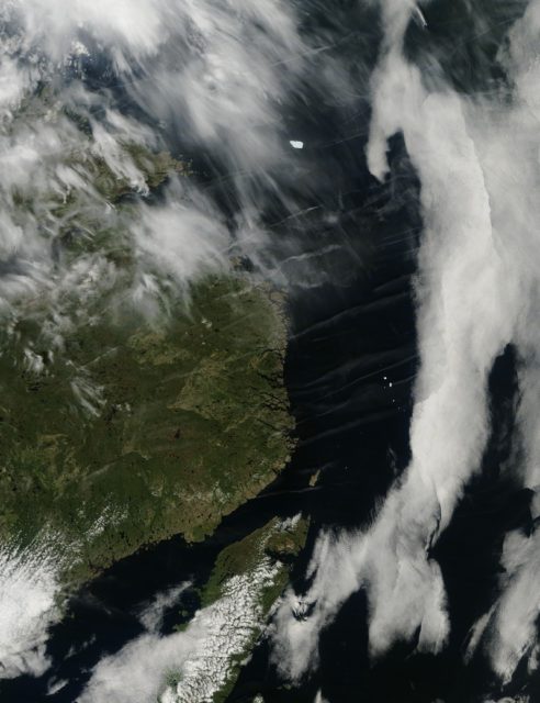 Natural-color image of an ice island off the coast of Labrador.