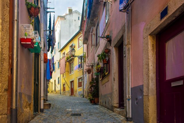 Typical traditional Portuguese cobblestone street in Lisbon, Portugal