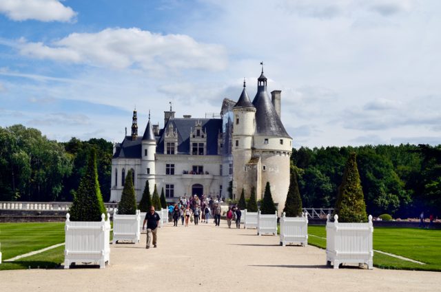 Chenonceau, France – June 11, 2011: Unidentified tourists by sighseeing of castle of Cenonceau, landmark and preferred tourist attraction
