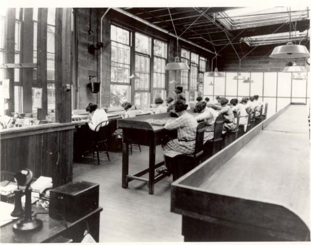Radium dial painters working in a factory