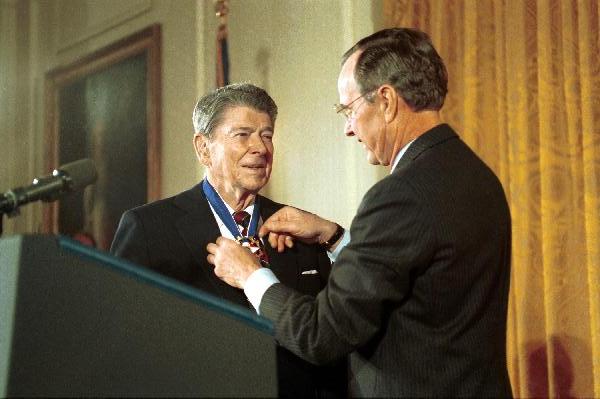 Former President Reagan returns to the White House to receive the Presidential Medal of Freedom from President Bush, 1993