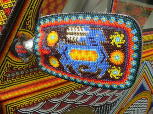 Closeup of a side mirror of the Vochol. Photo by Museo de Arte Popular CC BY 3.0
