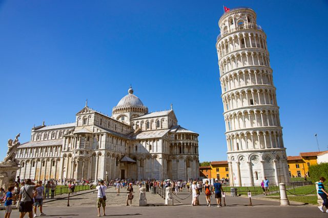 Pisa Leaning tower and Cathedra, and tourists l in Italy in summertime