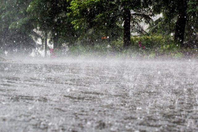 Torrential rain causing flood.