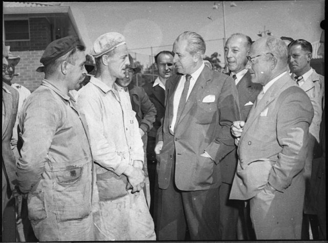 Holt as Minister for Labour at a Raymond Terrace Masonite factory in 1954.