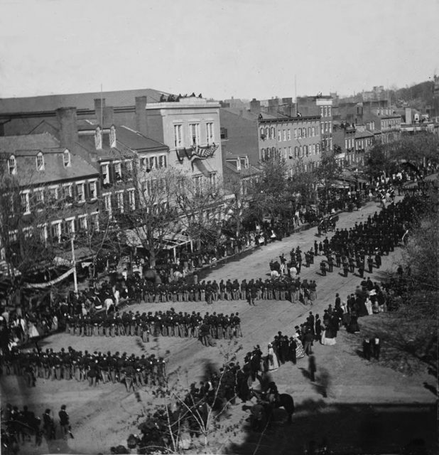 Military units marching down Pennsylvania Avenue in Washington D.C. during the state funeral for Abraham Lincoln on April 19, 1865.