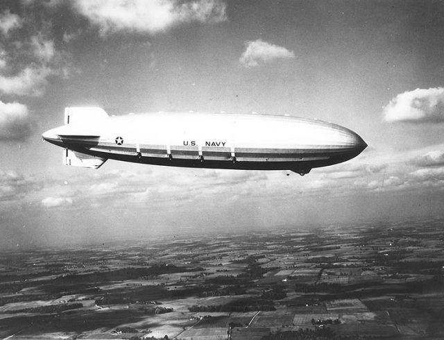 The maiden voyage of the Akron on November 2, 1931, showing her four starboard propellers. The engines’ water reclaiming devices appear as white strips above each propeller. The emergency rear control cabin is visible in the lower fin.