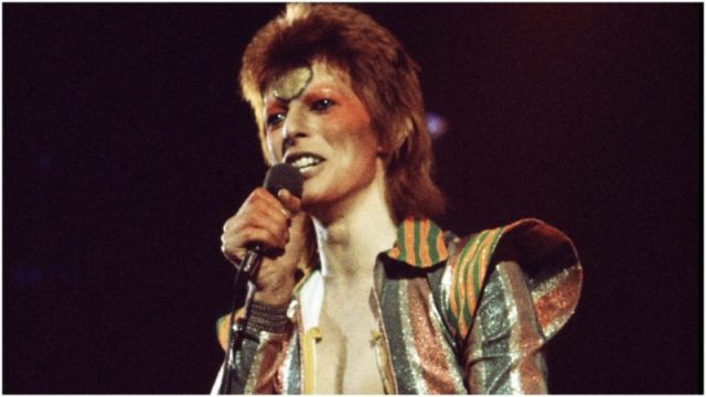 Bowie performing on his Ziggy Stardust/Aladdin Sane tour in London, 1973. Photo by Michael Putland/Getty Images
