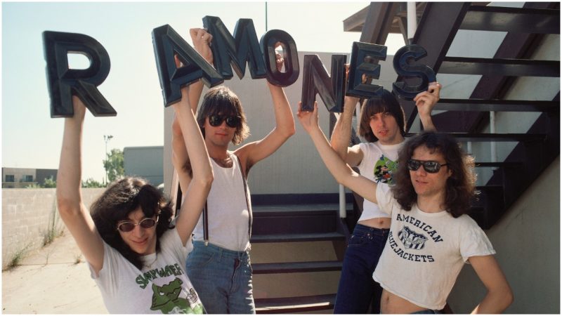 'The Ramones' pose for a portrait holding letters that spell out the name of their band outside the Santa Monica Civic Auditorium in Los Angeles, California in August of 1976. (Photo by Michael Ochs Archives/Getty Images)