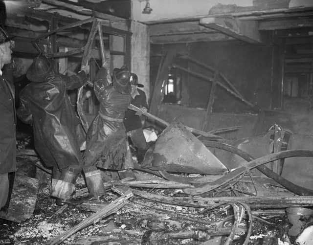 First responders working in the aftermath of the B-25 bomber crash