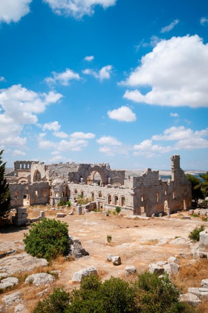 The Church of Saint Simeon the Stylite, near Aleppo, Syria. The remains of this once significant Byzantine church are still remarkably well intact. It was here that the Christian ascetic saint achieved fame for living 37 years on a small platform on top of a pillar, around which this church was later built.