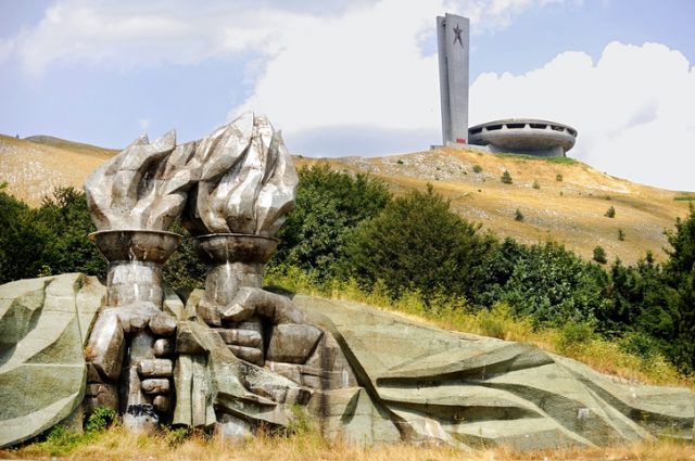 Pair of hands holding torches that sits at the bottom of Buzludzha communist monument, who once served as the House of the Bulgarian Communist Party…