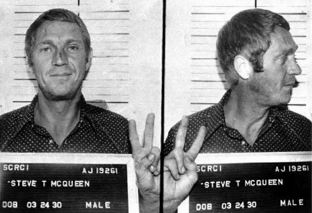 McQueen’s mug shot booking photographs for DWI in Alaska (1972, age 42)