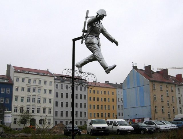 A sculpture called Mauerspringer (“Wall jumper”) by Florian and Michael Brauer and Edward Anders Photo: Jotquadrat – CC BY-SA 3.0
