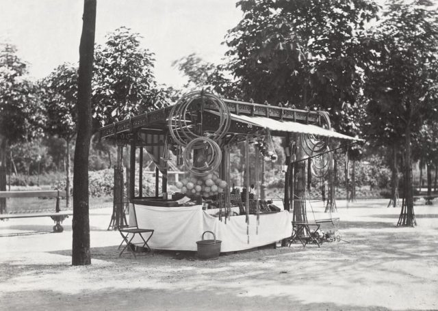 A covered stall that sells hoops and other toys, 1865