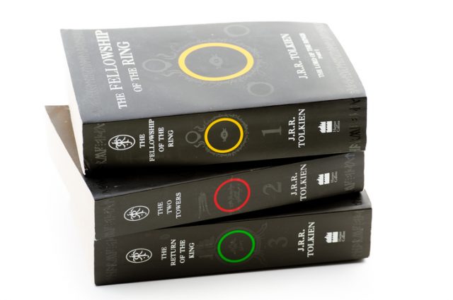 J.R.R. Tolkien’s epic fantasy trilogy “The Lord of the Rings,” which includes “The Fellowship of the Ring,” “The Two Towers,” and “The Return of the King.” These paperback editions were published by HarperCollins Publishers in 1999.