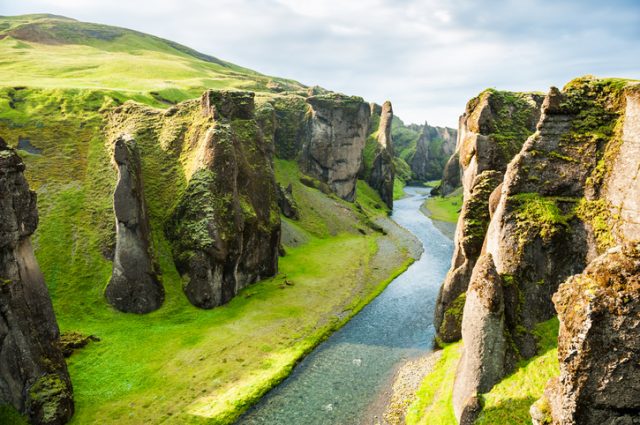 Fjadrargljufur canyon with river and big rocks. South Iceland