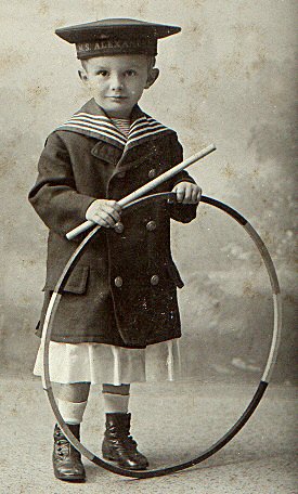 Boy with a hoop, 1900