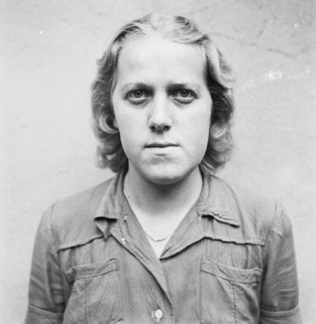 Herta Bothe, in Celle awaiting trial, August 1945. Herta Bothe participated in organizing and conducting a death march of women from central Poland to Bergen-Belsen. Her sentence was 10 years imprisonment, but Bothe was released early from prison on December 22, 1951.