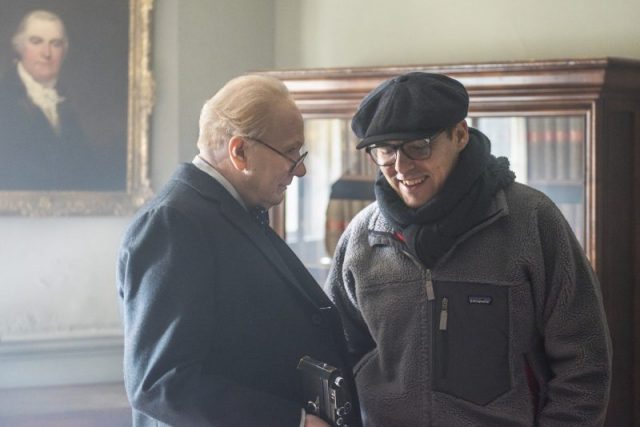 Actor Gary Oldman and director Joe Wright on the set of DARKEST HOUR, a Focus Features release. Credit: Jack English / Focus Features