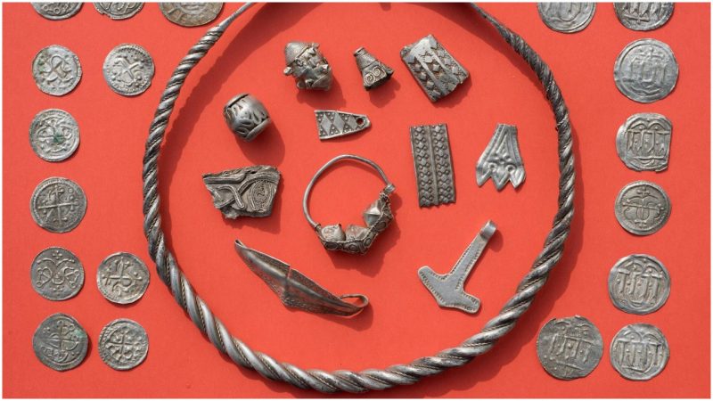 Braided necklaces, pearls, brooches, a Thor's hammer, rings and up to 600 chipped coins were found, including more than 100 that date back to Bluetooth's era. /(Photo credit STEFAN SAUER/AFP/Getty Images)