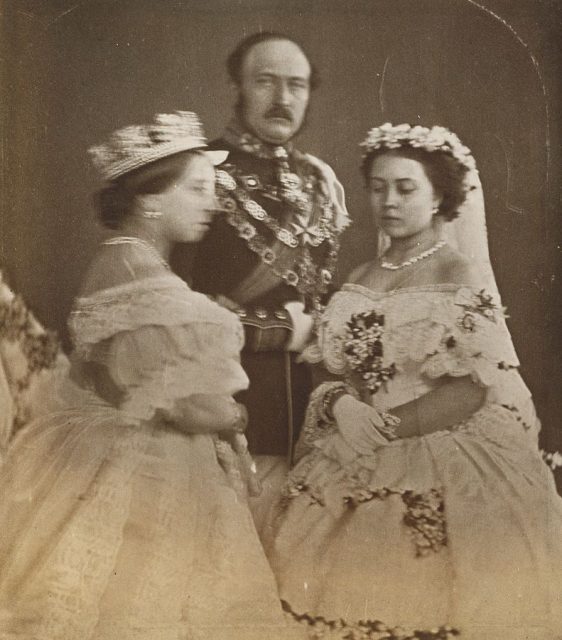 From left to right: Queen Victoria; Albert, the Prince Consort; and Victoria, Princess Royal. The occasion was the wedding day in 1858 of the Princess Royal, the eldest of all daughters born to Queen Victoria