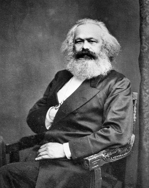 A portrait of Karl Marx.