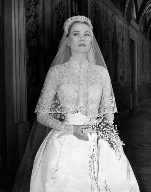 Princess Grace Kelly in her wedding dress at Prince’s Palace. Photo by Mondadori Portfolio via Getty Images