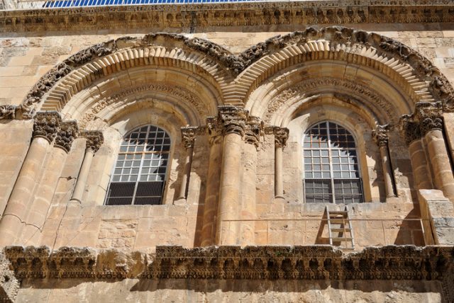 Byzantine facade and Immovable Ladder of Holy Sepulchre Church in Jerusalem.
