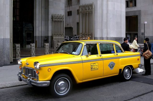 Looking south from Madison Avenue at restored Checker A-11 Cab being used as a prop