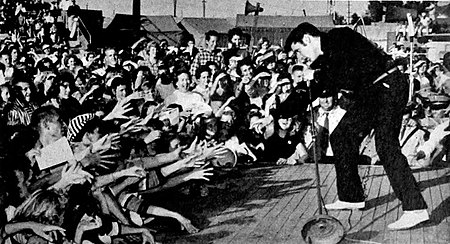 Presley performing live at the Mississippi-Alabama Fairgrounds in Tupelo, September 26, 1956