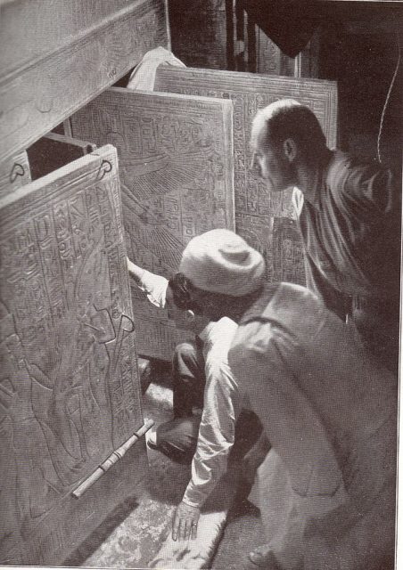 A photograph from “The New York Times” archives. Howard Carter is shown here kneeling alongside Arthur Callender and an Egyptian workman, opening doors at the King Tut’s age-old vault.