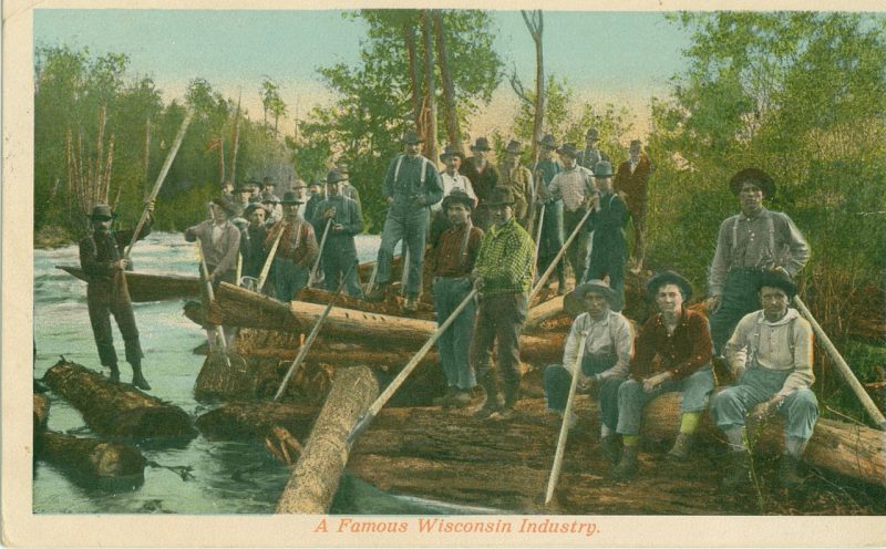 A group of Wisconsin lumberjacks pose on the side of a river, 1915.