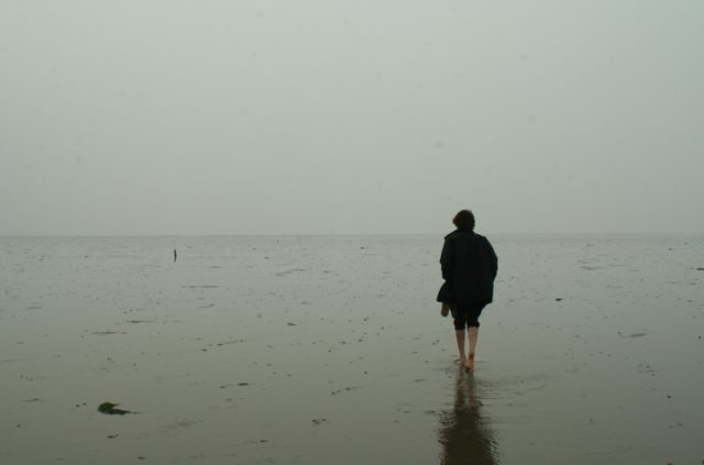 A walker on the Broomway. Photo by Qneiform CC BY-SA 3.0