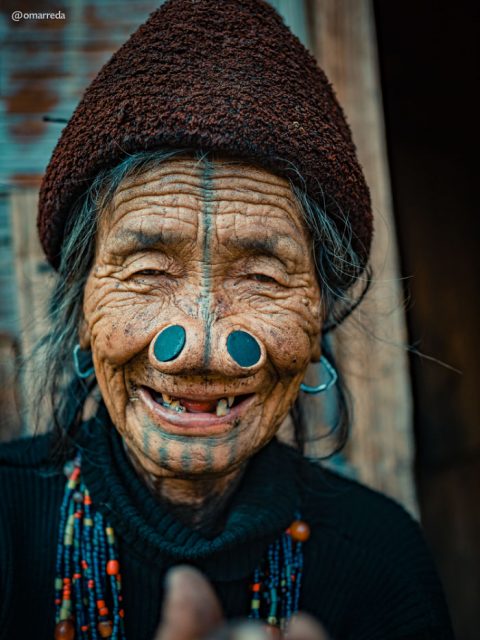 Originally, the nose plugs were inserted to make women in the Apatani villages less attractive to members of other tribes. Photo by Omar Reda
