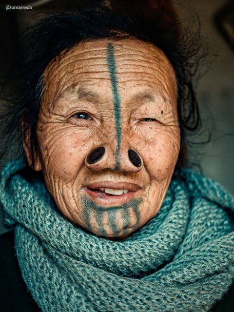 The dark tattoos were inked on the women’s faces typically around the time of their first period. Photo by Omar Reda