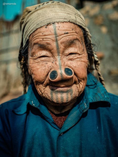 Besides the nose plugs, tattoos were applied on the women’s face as part of the age-old custom. Photo by Omar Reda