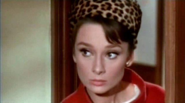 Audrey Hepburn in a scene from the comic thriller Charade, dressed by Givenchy, 1963.