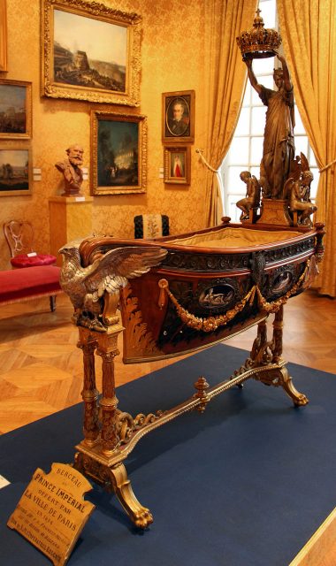 Ceremonial bercelonnette (cradle) of the imperial prince, 1856. The piece is housed in the Paris-based Musée Carnavalet. Photo by Sailko CC BY 3.0