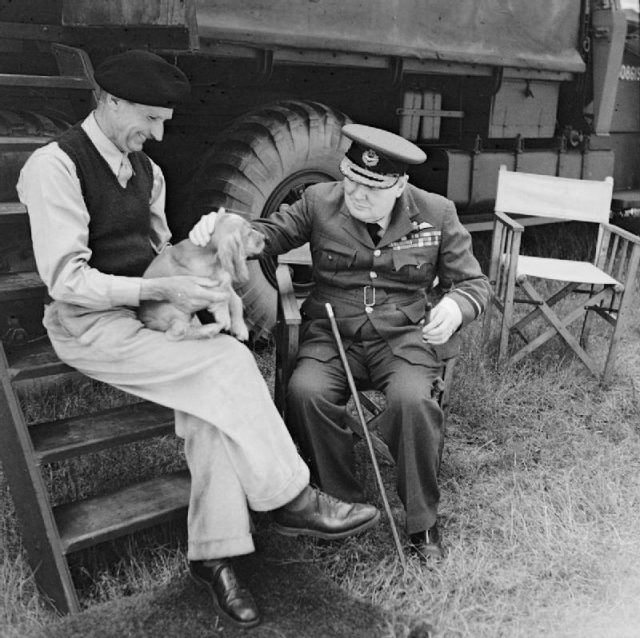 Churchill petting Monty’s dog, Rommel.