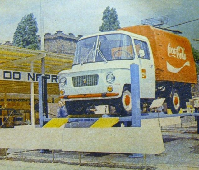 An illustration depicting a Coca-Cola delivery truck as of 1973