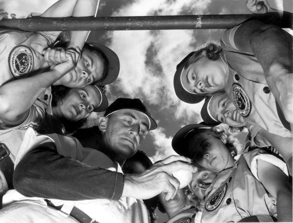 Dick Bass with members of the Fort Wayne Daisies baseball team, Opa-locka, Florida.