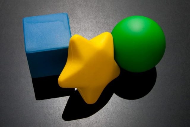 Different shaped stress balls, including a cube, a star, and a sphere. Photo by Stephen Edmonds CC BY SA 2.0