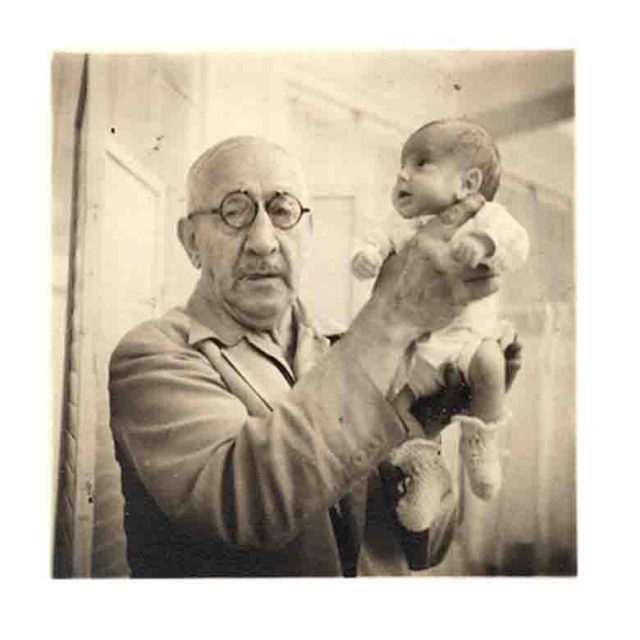 Martin Couney in 1941, holding a baby who was born weighing one pound, ten ounces. Today that baby, Beth Allen, is alive and well. Photo, courtesy Dawn Raffel.