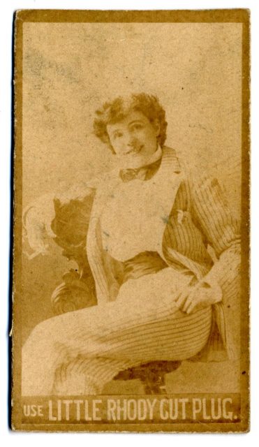 Full portrait of an unnamed actress with her legs crossed. Photo by Dr. Charles H. McCaghy Collection