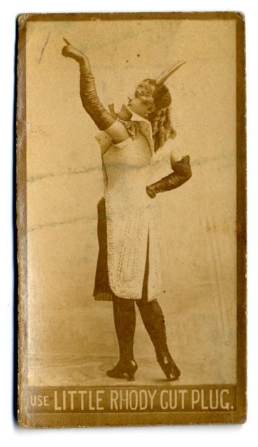 Full portrait of unnamed actress pointing at something, on Little Rhody Cut Plug tobacco card. Photo by Dr. Charles H. McCaghy Collection